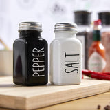 SISXSO Salt and Pepper Shakers Set, Cute Glass Spice Shaker with Stainless Steel Lid, Black and White Kitchen Table Decor and Accessories for Counter, for Kitchen Wedding Gifts, 2.7oz Each